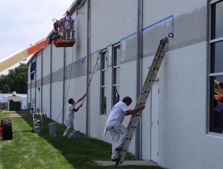 Painting crew on a commercial exterior